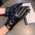 CHANEL TOUCHSCREEN GLOVES IN BLACK LAMBSKIN WITH GOLD LOGO 462271